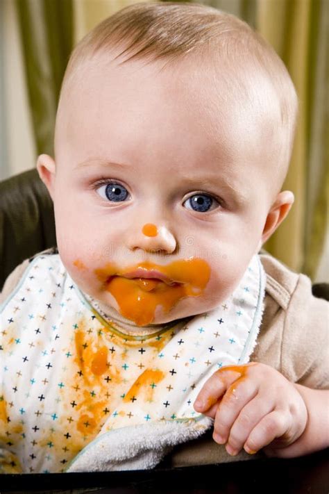 Messy Baby Wearing Bib After Eating Solid Food Stock Image - Image of ...