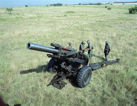 155 mm US towed howitzer M114 (M1) mod 1941 in firing position. 1985 ...