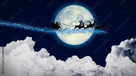 Santa Claus in a sleigh flying over the moon at night. Santa flies to deliver gifts. On night ...