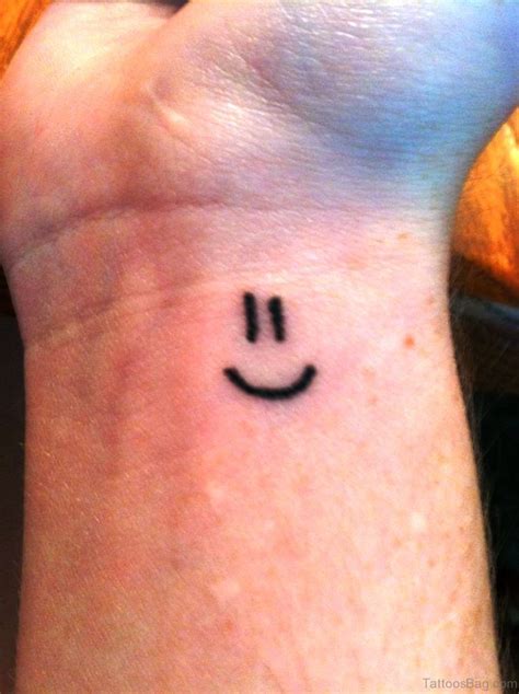 24 Wonderful Smile Wrist Tattoos - Tattoo Designs – TattoosBag.com