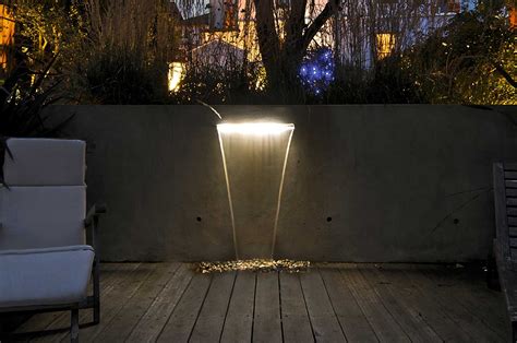 Garden water feature with lighting | Garden lighting design, Back garden design, Landscape lighting