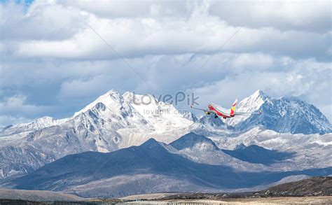 Airplane Flying Over Snow-capped Mountains Picture And HD Photos | Free Download On Lovepik