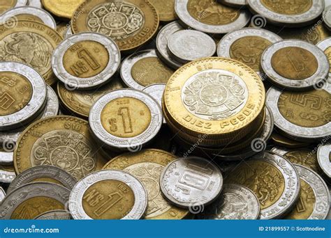 Ten Mexican Pesos Coin On A Pile Of Mexican Coins Stock Image | CartoonDealer.com #21899557