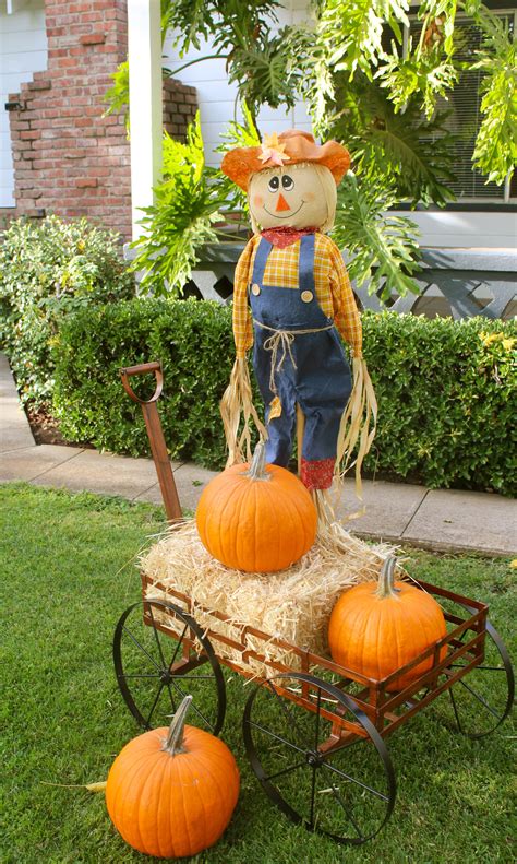 Scarecrow, wagon, straw & pumpkins | Fall yard decor, Fall decor ...