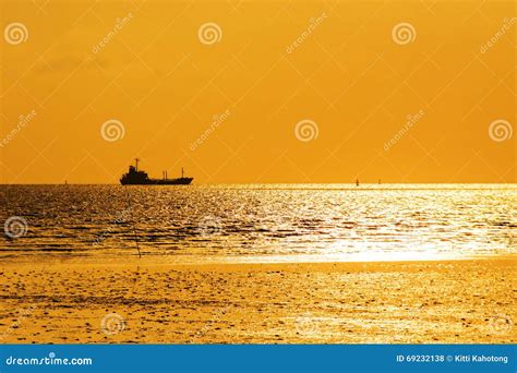 Silhouette of cargo ship stock photo. Image of container - 69232138