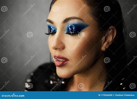 Portrait of a Beautiful Woman Face with Blue Eyes Make-up. Stock Photo ...