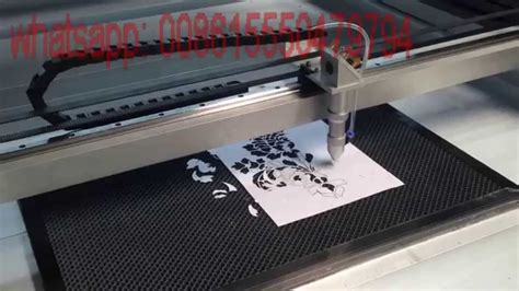 laser cutting machine with honey comb table cutting A4 paper - YouTube