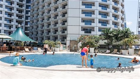 Swimming pool at Swissotel the Stamford and Fairmont Singapore | Hotel swimming pool, Staycation ...