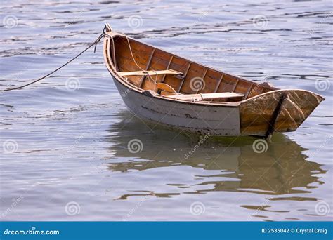 Wooden row boat stock photo. Image of floating, antique - 2535042