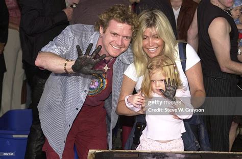 Drummer Rick Allen of Def Leppard with his wife and daughter pose for... News Photo - Getty Images