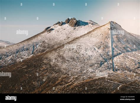 Winter hike in Mourne Mountains with perfectly visible peak of Slieve ...