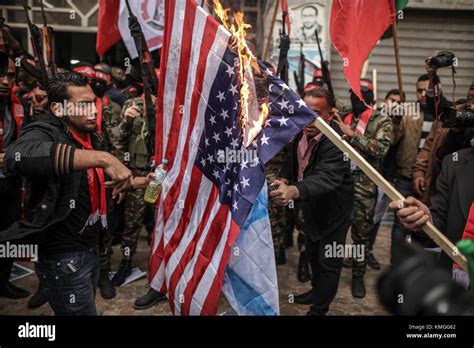 Gaza City, Gaza. 07th Dec, 2017. Palestinians burn an American flag ...