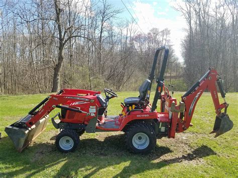 Massey ferguson gc1715 backhoe attachment