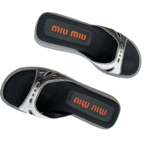 Miu Miu Women's Slides | Depop