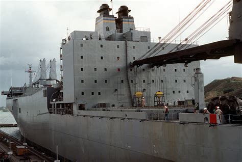 A port side view, looking forward, of the Military Sealift Command ...