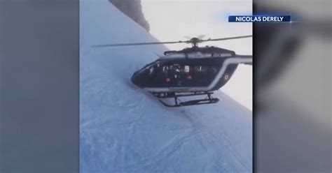 Injured skier rescued by French police helicopter in dramatic video