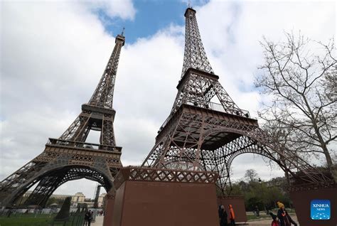 In pics: Eiffel Tower and its replica in Paris, France-Xinhua