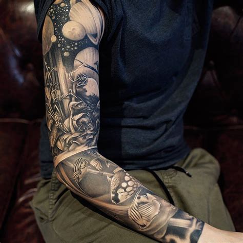 Black Sleeve Tattoo by KhanTattoo | Space tattoo sleeve, Sleeve tattoos, Full sleeve tattoos