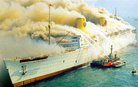 Cunard's former RMS Queen Elizabeth caught fire and sank in Hong Kong ...