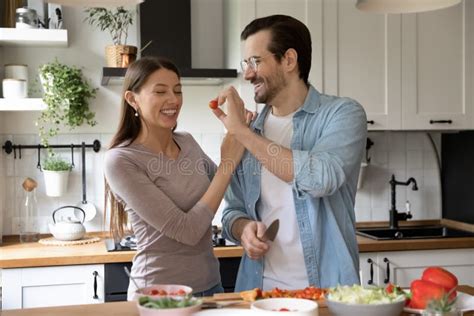 Happy Young Couple Have Fun Cooking Together at Home Stock Photo ...