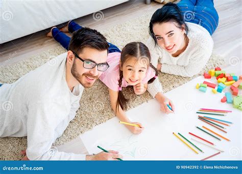 Family drawing together stock photo. Image of joyful - 90942392