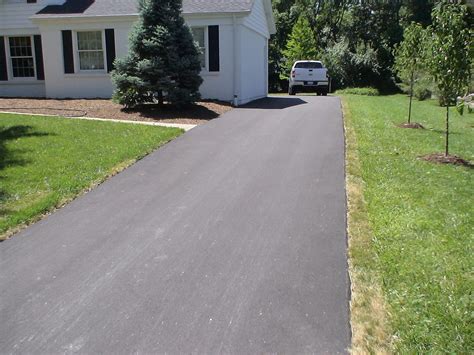 Asphalt driveway install | Driveway a week after the install… | Flickr