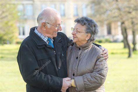 Elderly couple holding hands Stock Photo by ©photography33 106114320