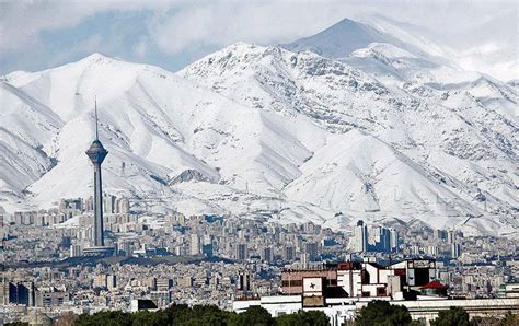 Tehran's winter; Milad Tower stands tall against the Albroz mountains ...