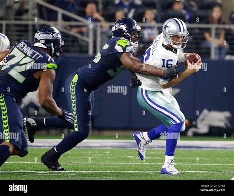 Seattle Seahawks' Cliff Avril sacks Dallas Cowboys' Matt Cassel during an NFL football game ...