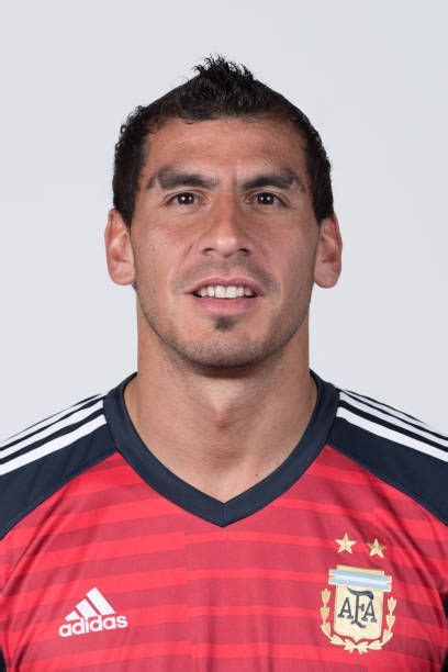 Goalkeeper Nahuel Guzman of Argentina poses for a portrait during the official FIFA World Cup ...