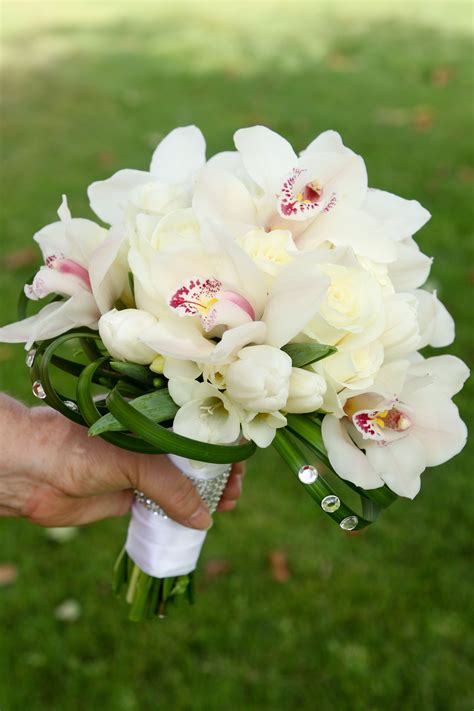 #white #cymbidium #orchid #bride #bouquet #bling | Flower bouquet wedding, Orchid bouquet ...