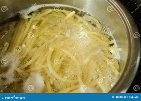 Boiling pasta in pot stock photo. Image of high, food - 112040640