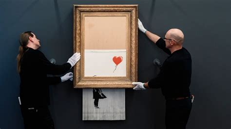 Banksy's part-destroyed painting on display - with shredder 'disabled' | Ents & Arts News | Sky News