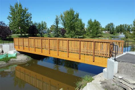 Glulam Beam Pedestrian Bridges | Custom Park & Leisure