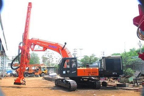 Mining Drill Rigs - Excavator Mounted Blast Hole Drilling Machine Manufacturer from Hyderabad