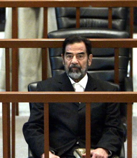 Saddam refuses to enter plea at trial