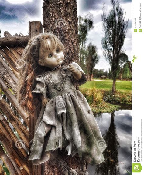 Girl Doll beside the Canal at the Island of the Dolls in Mexico Stock Photo - Image of dolls ...