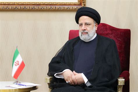 Raisi blames Biden for inciting "chaos and terror" in Iran | Reuters