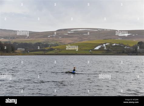 Hollingworth Lake, Rochdale, UK. 11th March 2018. UK Weather. Rowers were out early this morning ...