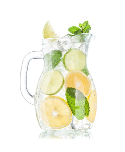 Premium Photo | Lemonade pitcher with lemon