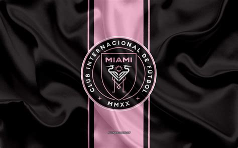 the miami club logo is on top of a black and pink satin background with ...