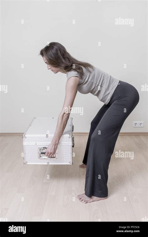 Stooping Posture High Resolution Stock Photography and Images - Alamy