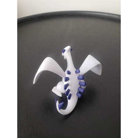 This is an Lugia Pokemon Figure. Authentic Tomy.... - Depop