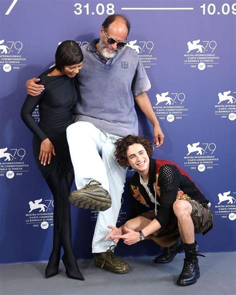 Timothée Chalamet with Taylor Russell and Luca Guadagnino at the photo call for Bones and All in ...