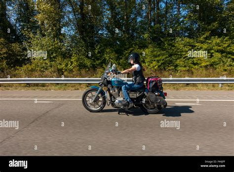 woman riding Harley Davidson motorcycle Stock Photo - Alamy