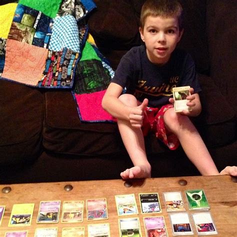 He is obsessed with Pokemon cards right now. He has achiev… | Flickr