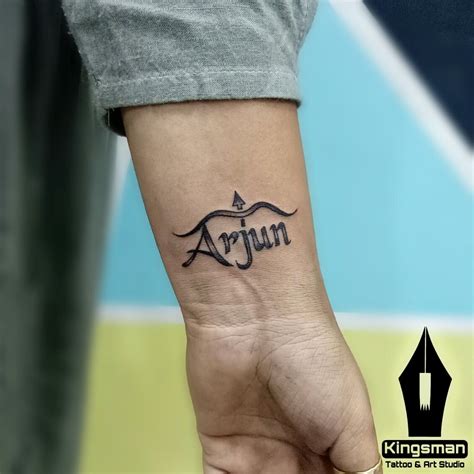 Name tattoo "Arjun" | Tattoos, Band tattoo designs, Name tattoo