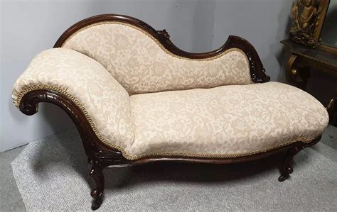 Victorian Chaise Lounge Of Small Proportions in Antique Sofas