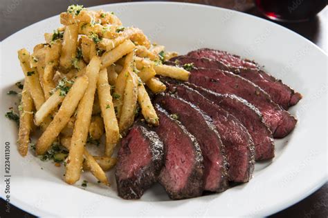 Hanger Steak with French Fries Stock Photo | Adobe Stock