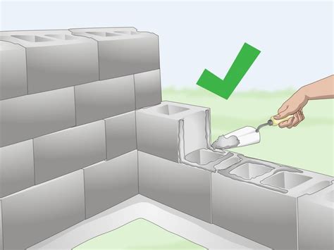 How to Build a Cinder Block Wall | Cinder block walls, Concrete block ...